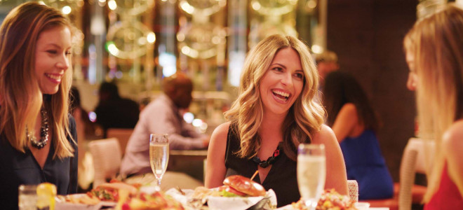 Three women dine at the restaurants at Saracen Casino.