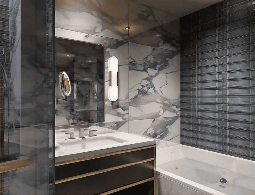 Modern bathroom with marble walls, a rectangular mirror with built-in lights, a sink with a double faucet, and a bathtub next to a dark textured tile accent wall.