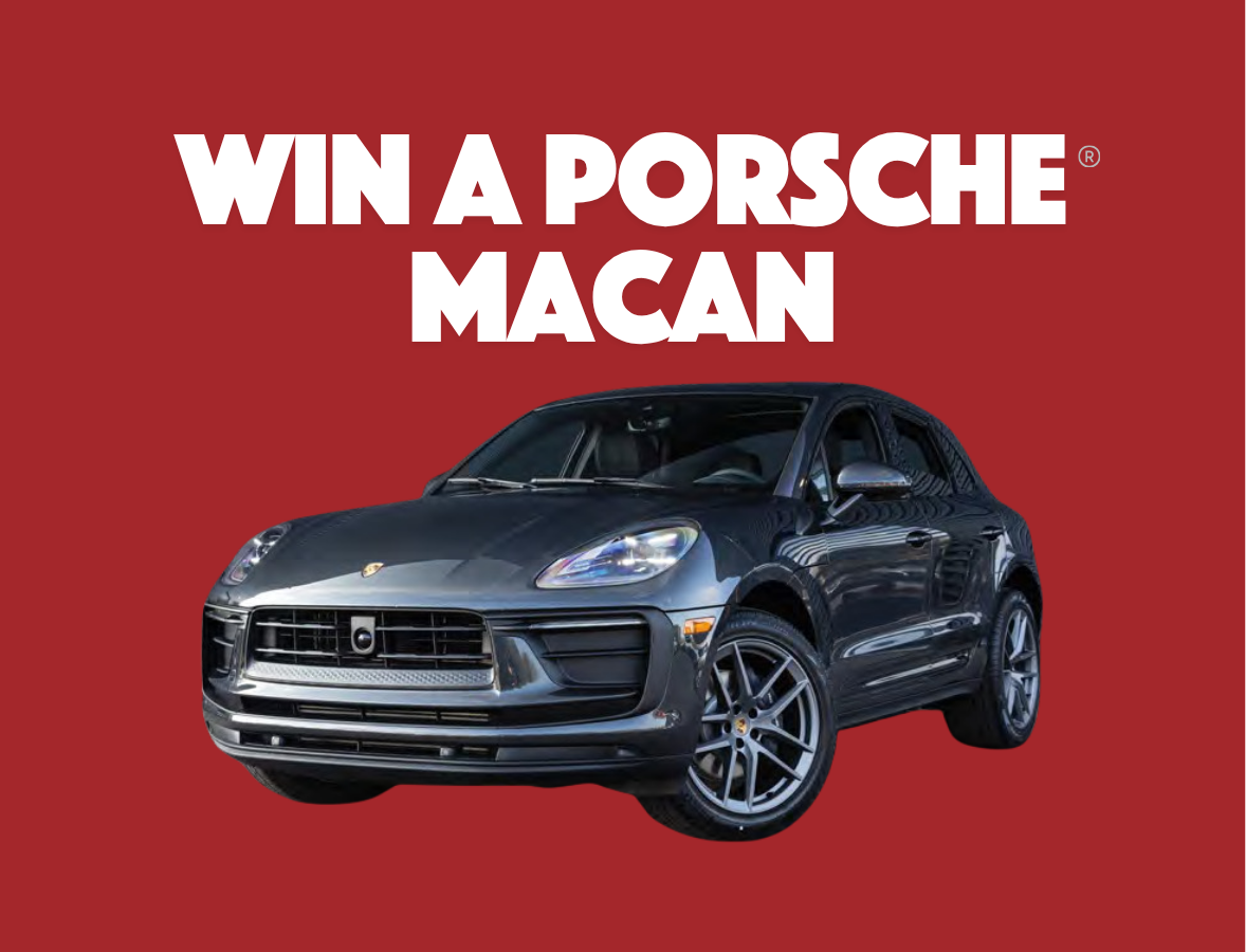 A black Porsche Macan SUV on a red background with large white text that reads “WIN A PORSCHE MACAN.”.
